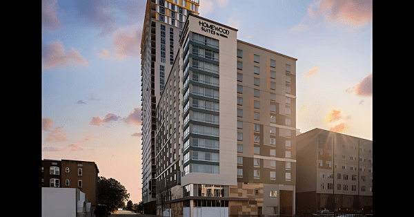 Exterior of Homewood Suites by Hilton in Charlotte during sunset with modern architecture