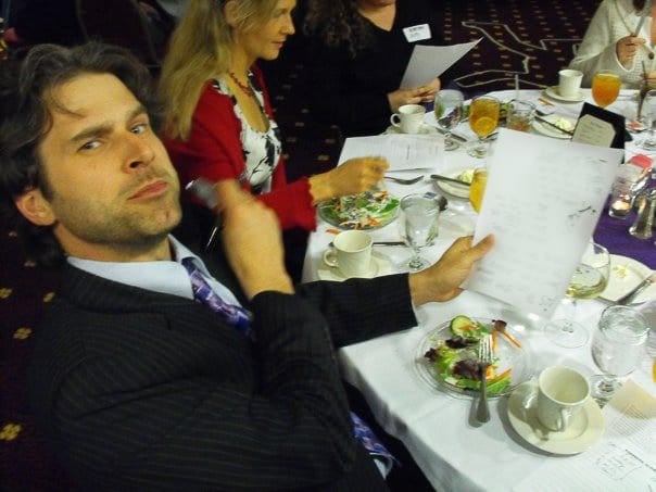 Audience members interacting in the Dinner Detective murder mystery dinner show in Lexington, KY