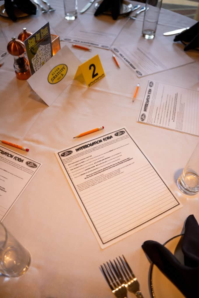 Interrogation forms table number and pencils set for guests at The Dinner Detective LexingtonInterrogation forms table number and pencils set for guests at The Dinner Detective Lexington