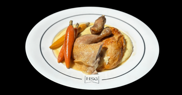 Plated chicken dinner with carrots and mashed potatoes served at The Dinner Detective Louisville private event.