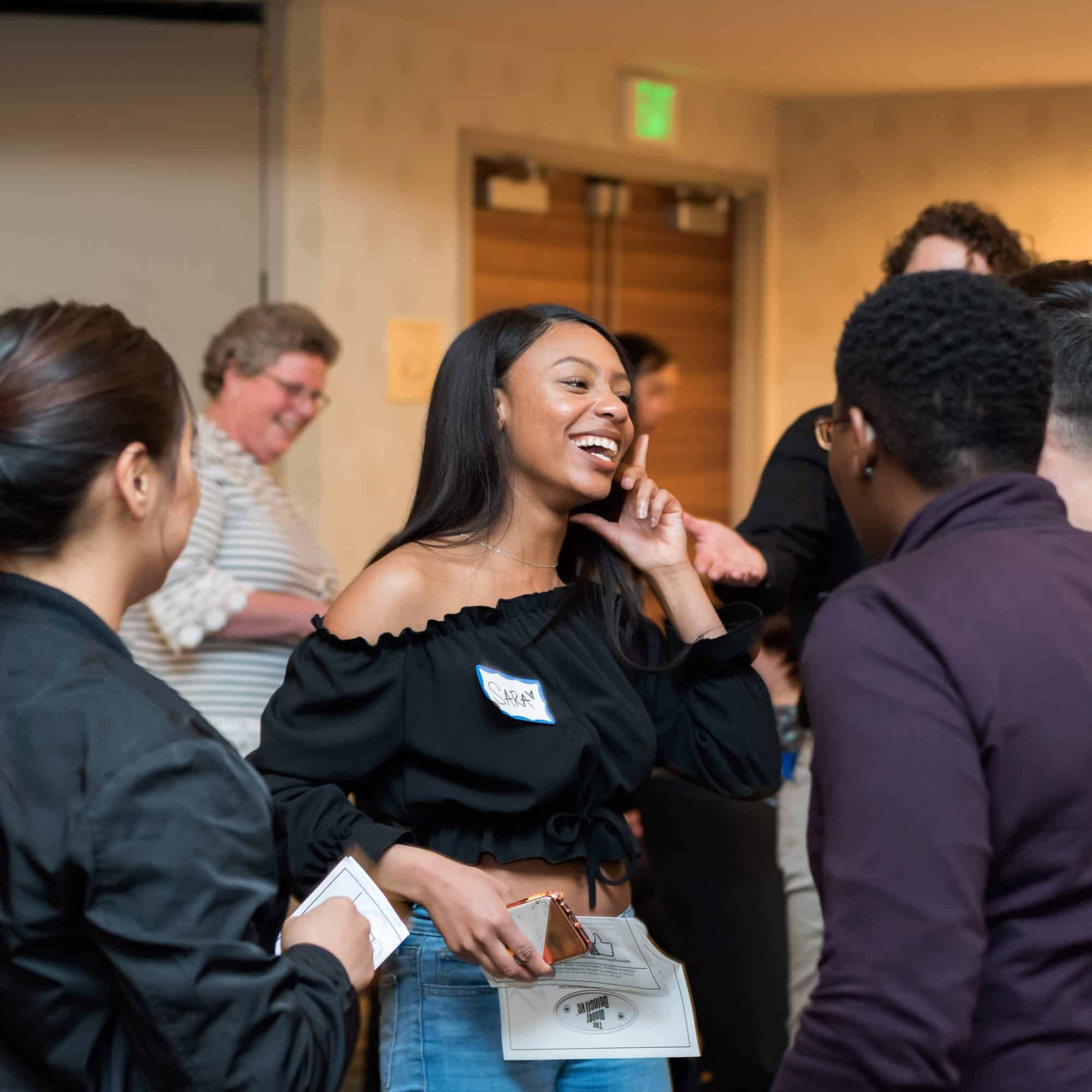 Guests interacting and enjoying The Dinner Detective’s private murder mystery event in Salt Lake City.
