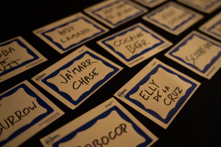 Close-up of playful name tags used for guests at The Dinner Detective murder mystery dinner show in Salt Lake City.
