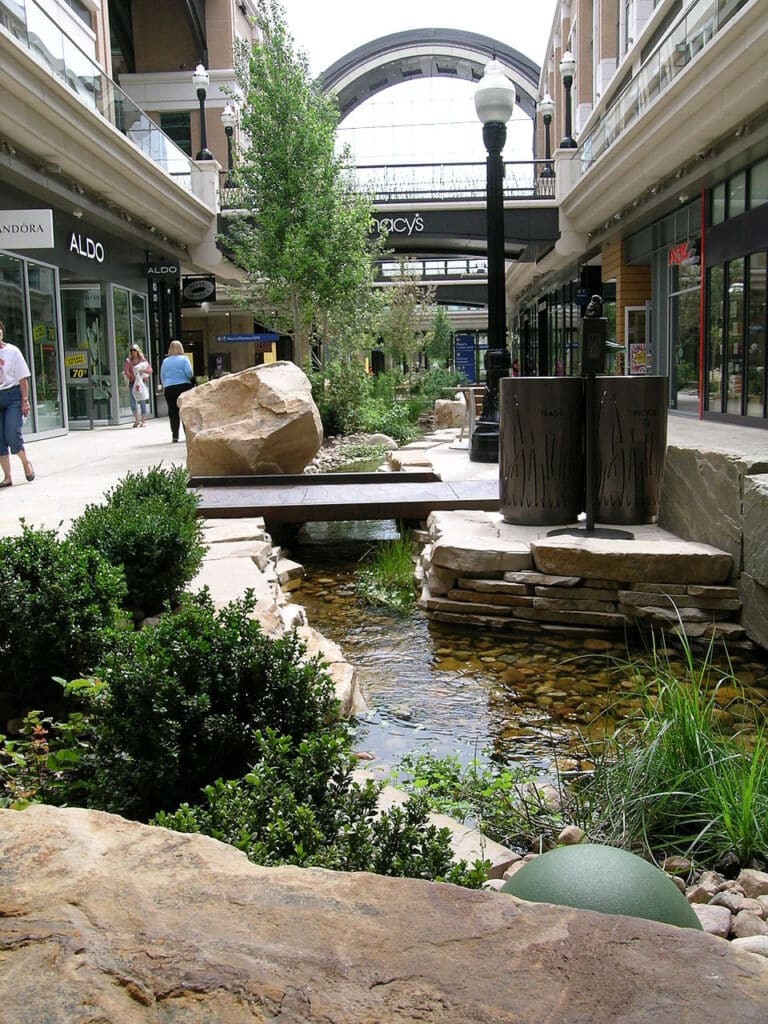 The artificial creek and shopping walkway at City Creek Center, one of the top indoor activities Salt Lake offers for luxury shopping and dining.
