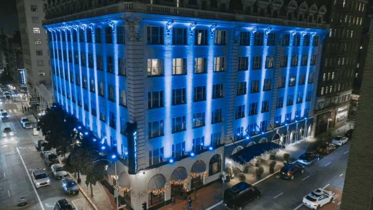The Marker Hotel in San Francisco lit up in blue at night