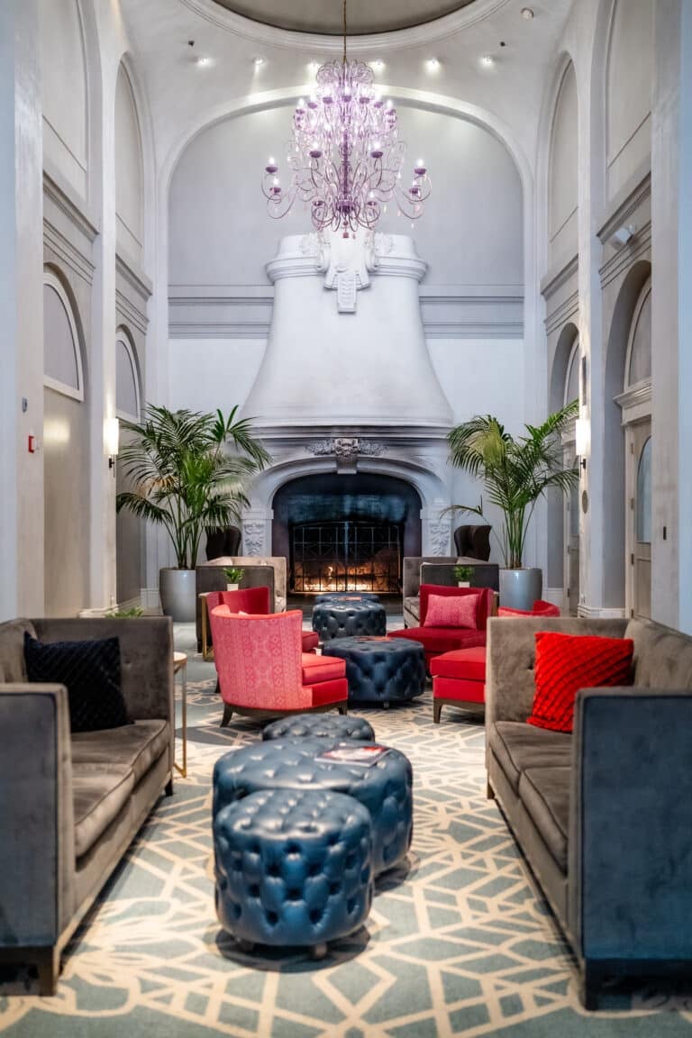 Elegant hotel lobby at The Marker San Francisco with colorful seating and fireplace