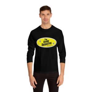 A person wears a Unisex Classic Long Sleeve T-Shirt in black with The Dinner Detective logo in yellow and white. It features ribbed cuffs and offers a classic fit, set against a plain white background that highlights its timeless appeal.
