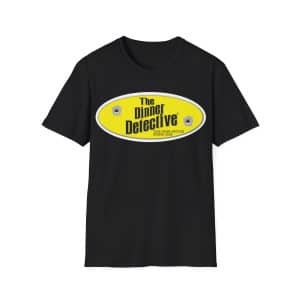 The Unisex Softstyle T-Shirt in black features a yellow oval logo with The Dinner Detective centered and two discreet bullet hole graphics, along with the phrase Americas Largest Interactive Murder Mystery Dinner Show.